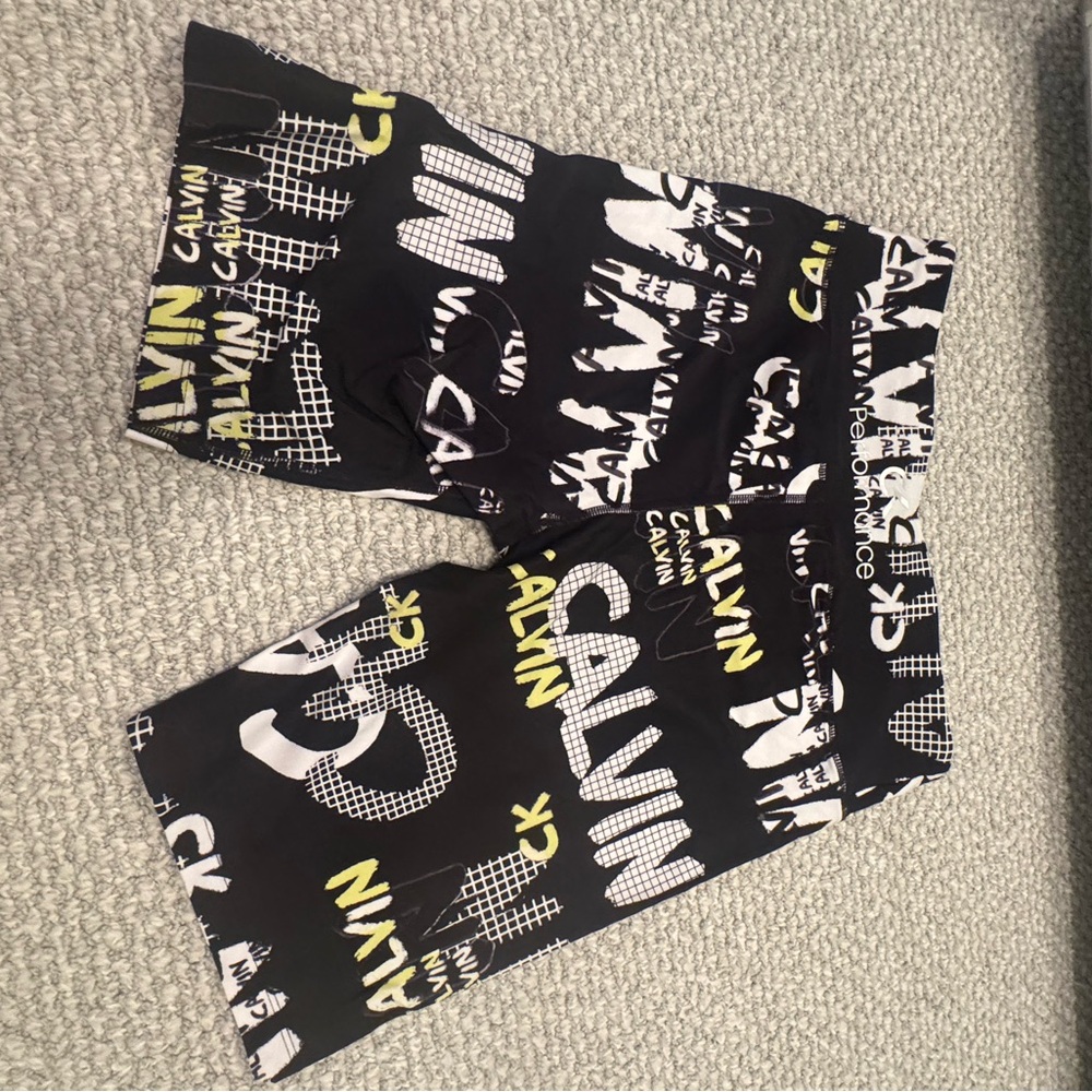 Calvin Klein Black and White Graphic Shorts with Yellow Highlights